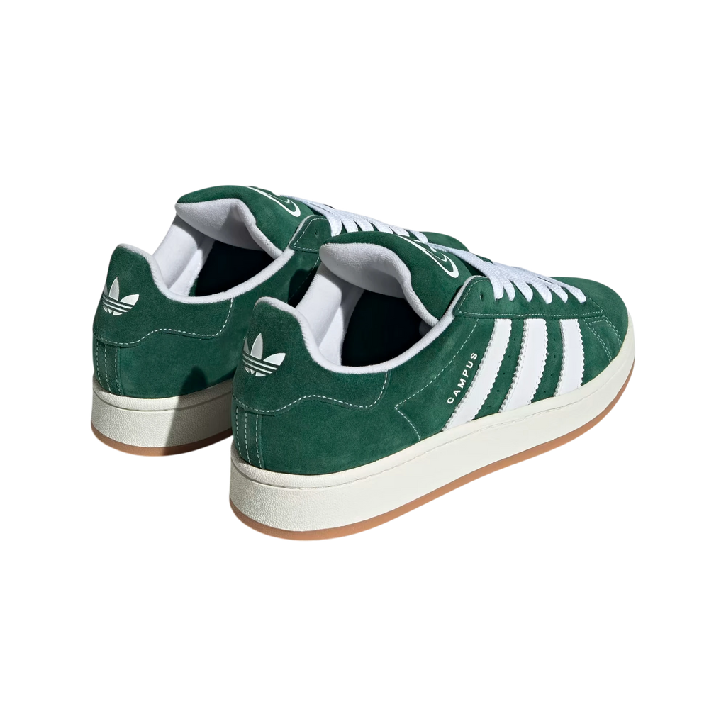 Zapatillas Adidas Campus 00s de ante verde oscuro con detalles blancos y suela de goma. Estilo urbano retro.