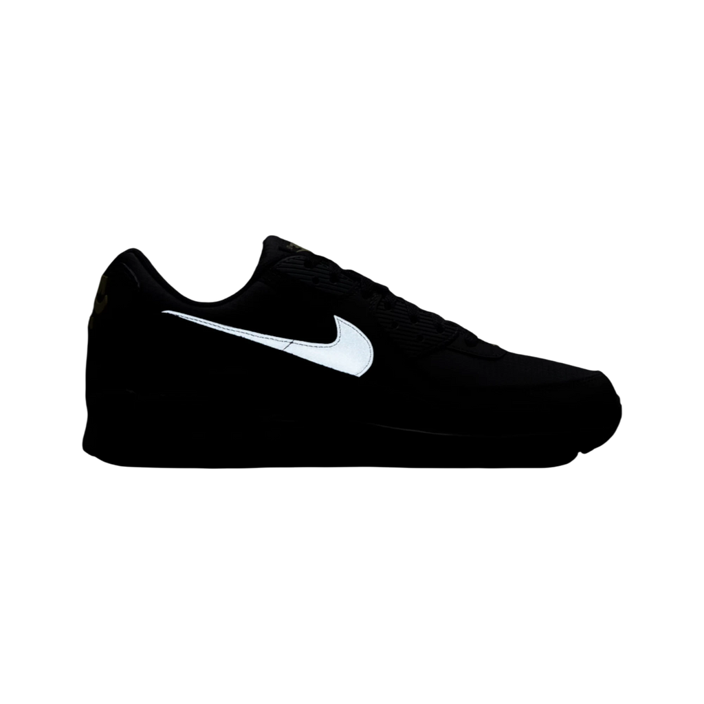 Zapatillas THE KICKS WORLD Nike Air Max 90 en negro con detalles en dorado y swoosh reflectante en vista lateral