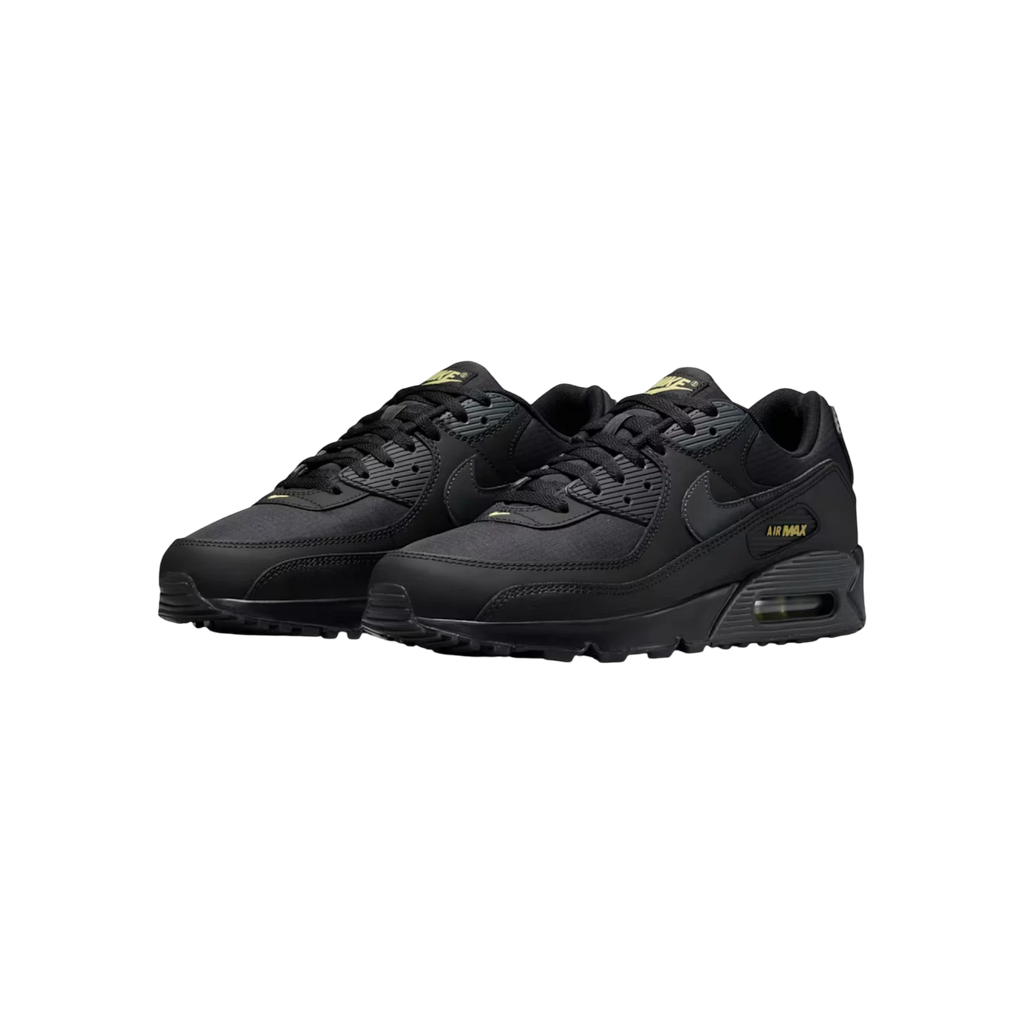 Zapatillas THE KICKS WORLD Nike Air Max 90 en negro con detalles en dorado, fabricadas en malla y piel de alta calidad.
