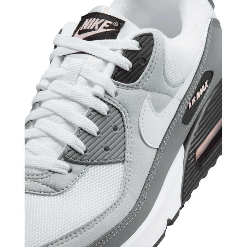 Zapatillas Nike Air Max 90 Pink Foam de THE KICKS WORLD con malla blanca, detalles en gris y acentos rosa suave.