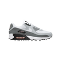 Zapatillas Nike Air Max 90 en blanco, gris y rosa Pink Foam de THE KICKS WORLD con unidad Air visible y diseño retro.